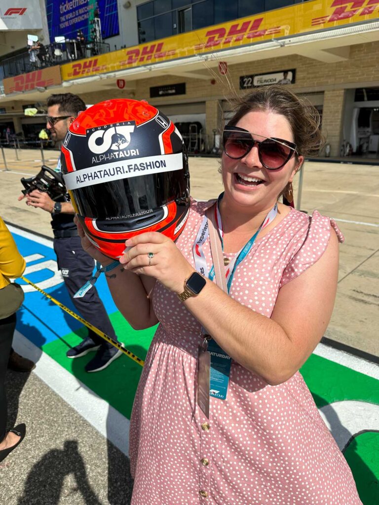 Amanda with a race helmet | What to pack for a Formula 1 race